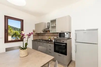 Cucina o angolo cottura di Casa Bianco Navarrese B