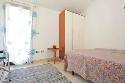 Letto o letti in una camera di Casa Bianco Navarrese B