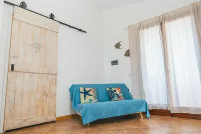 Letto o letti in una camera di Il Sogno Casa Vacanze