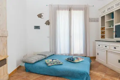 Letto o letti in una camera di Il Sogno Casa Vacanze