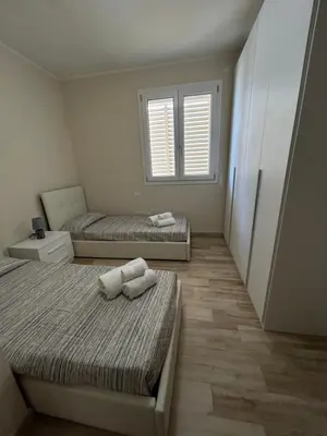 Letto o letti in una camera di Residenza del Parco