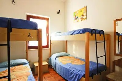 Letto o letti in una camera di Apartment on Costa Rei near Sandy Beaches