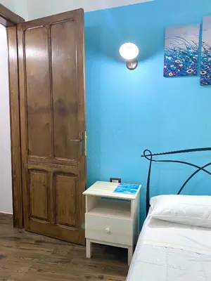 Letto o letti in una camera di Dani's House - affittacamere nel cuore di Cagliari