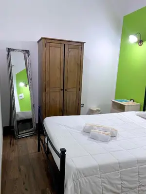 Letto o letti in una camera di Dani's House - affittacamere nel cuore di Cagliari