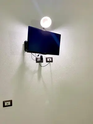 TV o dispositivi per l'intrattenimento presso Dani's House - affittacamere nel cuore di Cagliari
