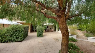 Giardino di Villa Luigi a Poggio dei Pini, alloggio con giardino e posto auto
