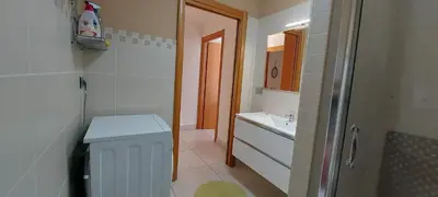 Bagno di Villa Luigi a Poggio dei Pini, alloggio con giardino e posto auto