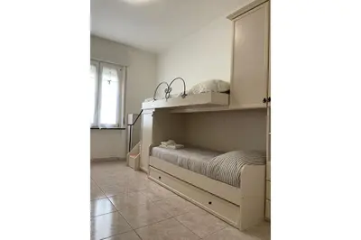 Letto o letti in una camera di Pierluigi's House
