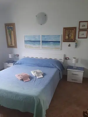 Letto o letti in una camera di Villetta Cristallina- Marina di Tertenia