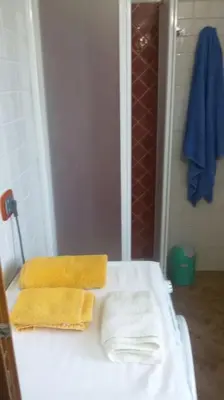 Letto o letti in una camera di Villetta Cristallina- Marina di Tertenia