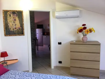 Letto o letti in una camera di Appartamento Oristano città