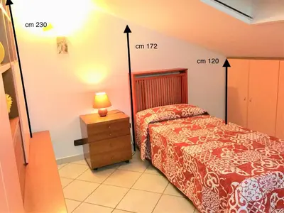 Letto o letti in una camera di Appartamento Oristano città