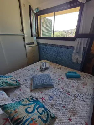 Letto o letti in una camera di Villetta Sara