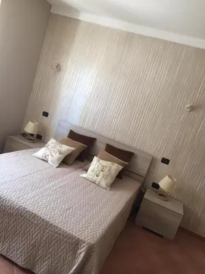 Letto o letti in una camera di Casa Sù Flamingo