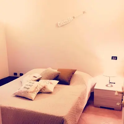 Letto o letti in una camera di Casa Sù Flamingo
