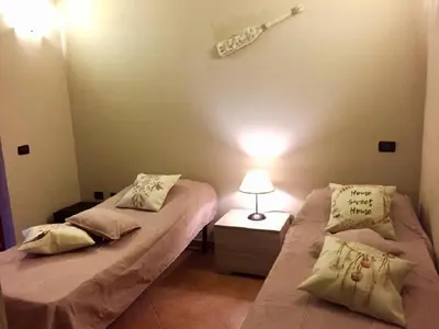 Letto o letti in una camera di Casa Sù Flamingo