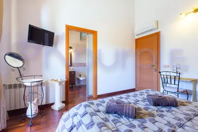 Letto o letti in una camera di LE API