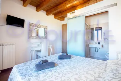 Letto o letti in una camera di LE API