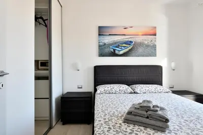 Letto o letti in una camera di Giorgio holiday home Torre di Barì