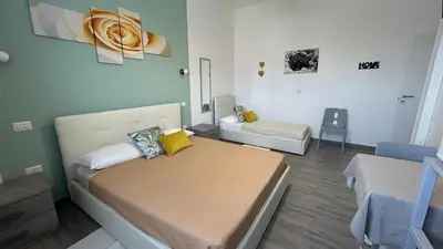 Letto o letti in una camera di B&B Dea Madre