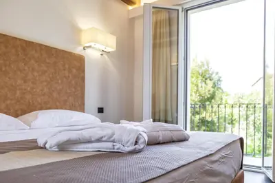 Letto o letti in una camera di Raphael Hotel Arbatax
