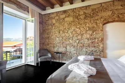 Letto o letti in una camera di Raphael Hotel Arbatax