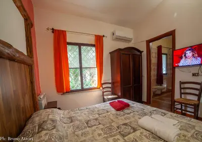 Letto o letti in una camera di Sa Tanchitta