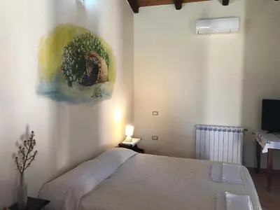 Letto o letti in una camera di Sa Tanchitta
