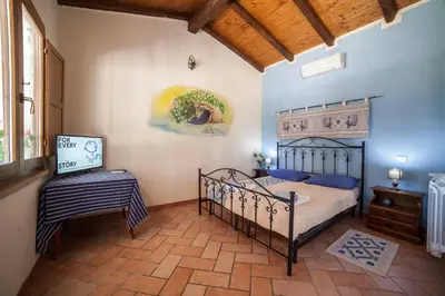 Letto o letti in una camera di Sa Tanchitta