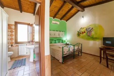 Letto o letti in una camera di Sa Tanchitta