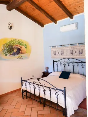 Letto o letti in una camera di Sa Tanchitta