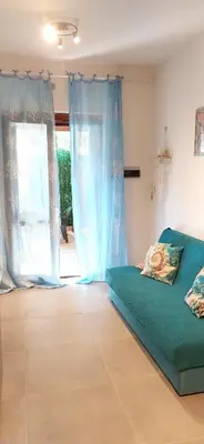 Letto o letti in una camera di Villa Acquamarina Villasimius