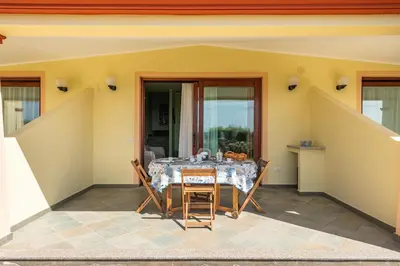 Balcone o terrazza di casa con vista a Chia
