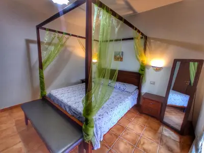 Letto o letti in una camera di Casa SERENAS, a 5 minuti dal mare con parcheggio, clima e tutto il necessario per la tua vacanza in relax