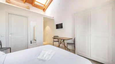 Letto o letti in una camera di Italianway - Locanda della Meridiana