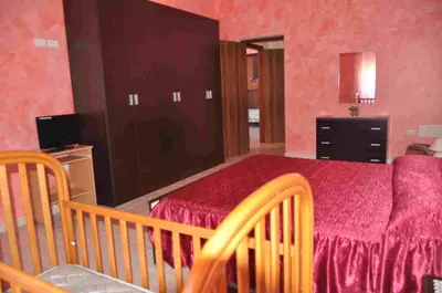 Letto o letti in una camera di B&B Il Gabbiano