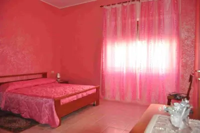 Letto o letti in una camera di B&B Il Gabbiano