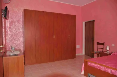 Letto o letti in una camera di B&B Il Gabbiano