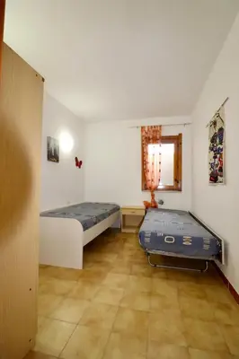Letto o letti in una camera di Appartamento Torre 82