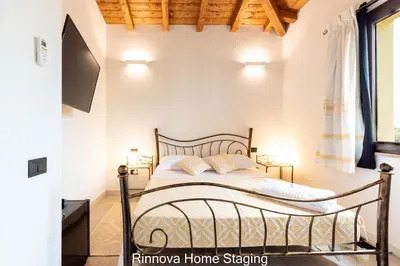 Letto o letti in una camera di Villa Vitto - Sleep & Go