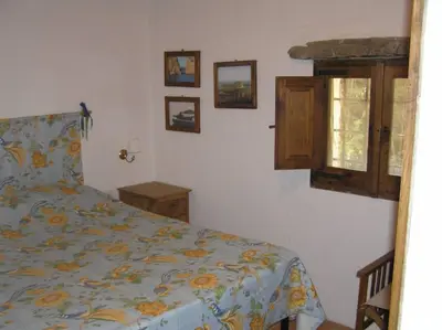 Letto o letti in una camera di Bamboo House