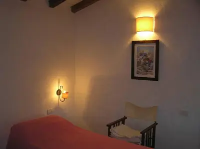 Letto o letti in una camera di Bamboo House