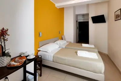 Letto o letti in una camera di Hotel Poetto