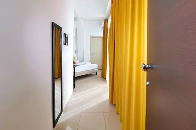 Letto o letti in una camera di Hotel Poetto