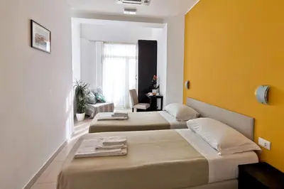 Letto o letti in una camera di Hotel Poetto