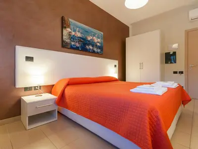 Letto o letti in una camera di Al Molì Affittacamere