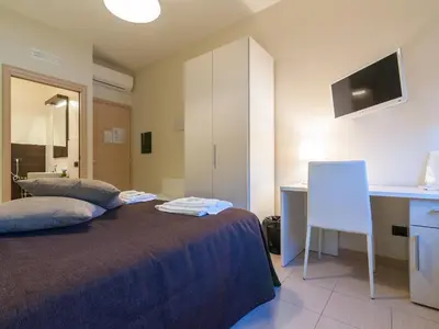 Letto o letti in una camera di Al Molì Affittacamere