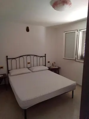 Letto o letti in una camera di 18 Via Sa Salina PORTOPINO