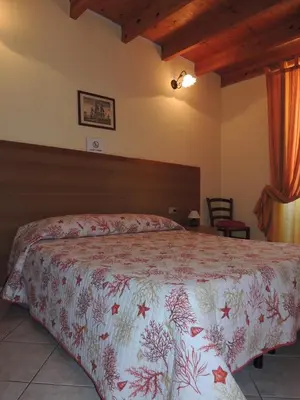 Letto o letti in una camera di La marina