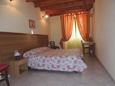 Letto o letti in una camera di La marina